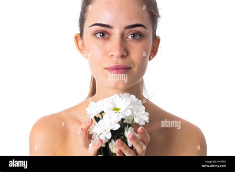 woman holding white flowers|More.